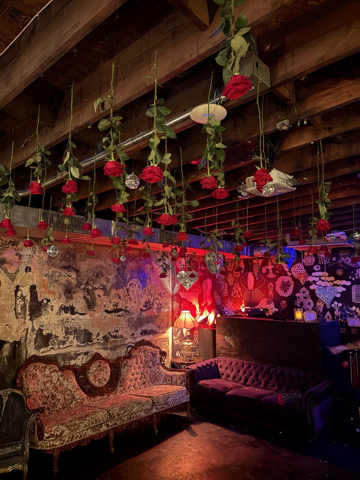 Romantic venue with hanging red roses